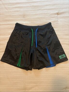 Air Jordan X Aleali May Women's Black Pleated Shorts with Blue & Green Accents